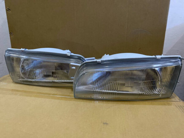 Faros Mitsubishi Lancer 93/97 De Vidrio